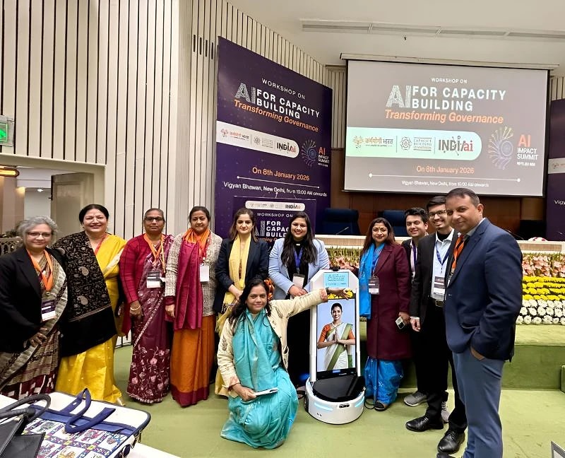 Officials with Nityani's robot form