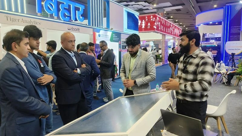 Delegates trying a live AI human demo
