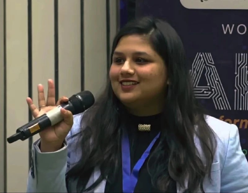 Tanishi Mookerjee speaking at the AI by HER bootcamp